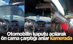 Otomobilin kaputu açılarak ön cama çarptığı anlar kamerada