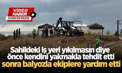 Sahildeki iş yeri yıkılmasın diye önce kendini yakmakla tehdit etti, sonra balyozla ekiplere yardım etti