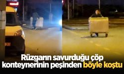 Rüzgarın savurduğu çöp konteynerinin peşinden böyle koştu