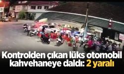 Kontrolden çıkan lüks otomobil, kahvehaneye daldı: 2 yaralı