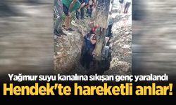 Hendek'te hareketli anlar! Yağmur suyu kanalına sıkışan genç yaralandı