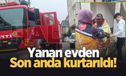 Yanan evdeki engelliyi komşuları kurtardı