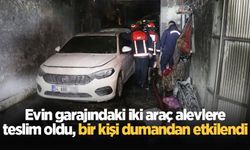 Evin garajındaki iki araç alevlere teslim oldu, bir kişi dumandan etkilendi