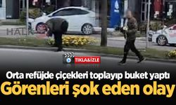 Orta refüjde çiçekleri toplayıp buket yaptı!