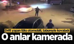 Drift yapan lüks otomobili, tabureyle kovaladı: O anlar kamerada