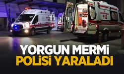 Yorgun mermi polisi yaraladı