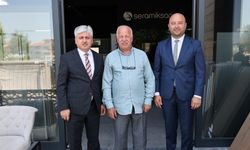 Vali Rahmi Doğan, MHP İl Başkanı Alkaş'ı işyerinde ziyaret etti
