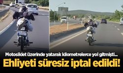 Motosiklet üzerinde yatarak kilometrelerce yol gitmişti... Ehliyeti süresiz iptal edildi!