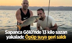 Sapanca Gölü’nde 13 kilo sazan yakaladı: Öpüp suya geri saldı