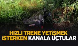 Trene yetişmek isterken kanala uçtular: 2 yaralı