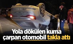 Yola dökülen kuma çarpan otomobil takla attı