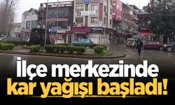 Yüksek kesimlerde 20 santimetreye ulaşan kar, ilçe merkezinde de yağmaya başladı