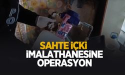Sahte içki imalathanesine operasyon kamerada