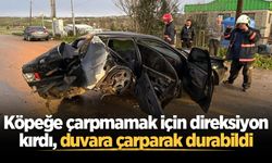 Köpeğe çarpmamak için direksiyon kırdı, duvara çarparak durabildi