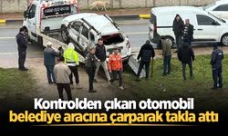 Kontrolden çıkan otomobil, belediye aracına çarparak takla attı