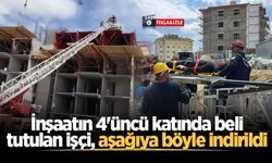 İnşaatın 4'üncü katında beli tutulan işçi, aşağıya böyle indirildi