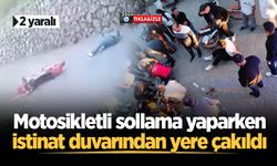 Karasu'da motosikletli sollama yaparken istinat duvarından yere çakıldı: 2 yaralı
