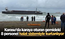 Karasu'da karaya oturan gemideki 8 personel kurulan halat sistemiyle kurtarılıyor