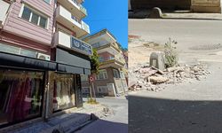 Şehir merkezindeki binadan kopan beton parçaları yola düştü