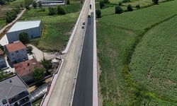 Büyükşehir Yazlık Kavşağı’nın trafik yükünü alacak duble yolda asfalt çalışmasına başladı