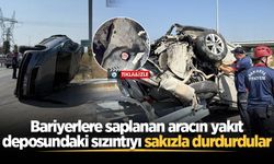 Bariyerlere saplanan aracın yakıt deposundaki sızıntıyı sakızla durdurdular