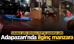Adapazarı'nda ilginç manzara: Sokaklar göle dönünce SUP ile gezintiye çıktı