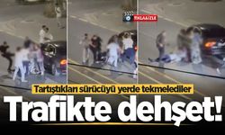 Adapazarı'nda trafikte dehşet! Tartıştıkları sürücüyü yerde tekmelediler