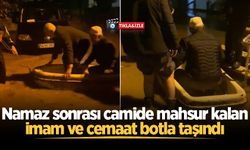 Namaz sonrası camide mahsur kalan imam ve cemaat botla taşındı