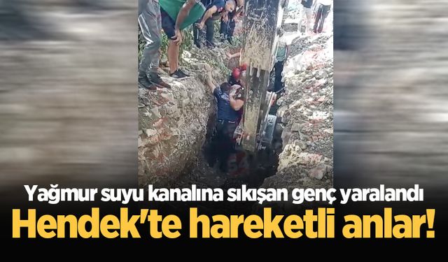 Hendek'te hareketli anlar! Yağmur suyu kanalına sıkışan genç yaralandı