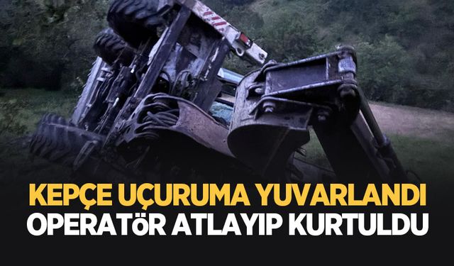 Yamaçtan yuvarlanan iş makinesinden atlayarak kurtuldu