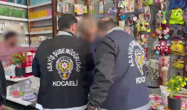 10 yıldır aranan firari dükkanında yakalandı, kelepçeye itiraz etti