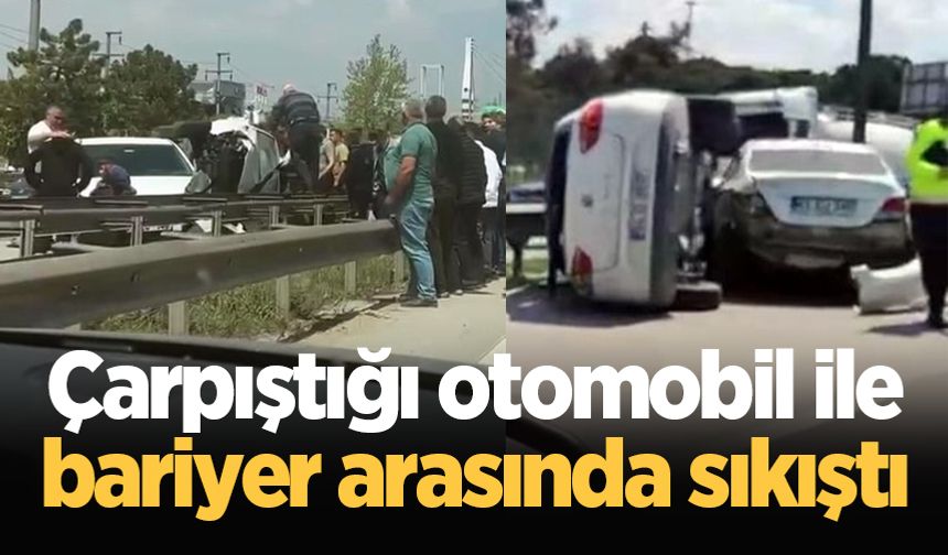 Çarpıştığı otomobil ile bariyer arasında sıkıştı