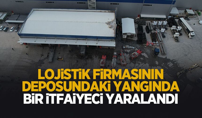 Lojistik deposu yangınında bir itfaiyeci yaralandı