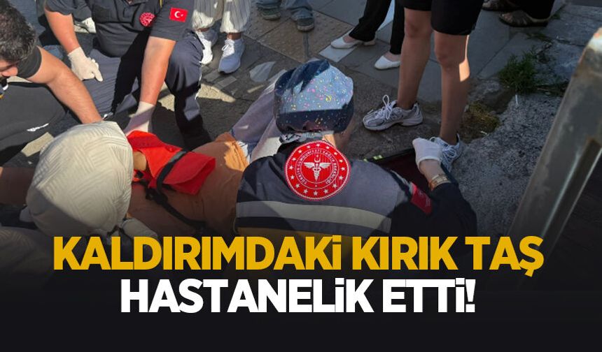 Kırılan kaldırım taşı hastanelik etti; İşte o anlar