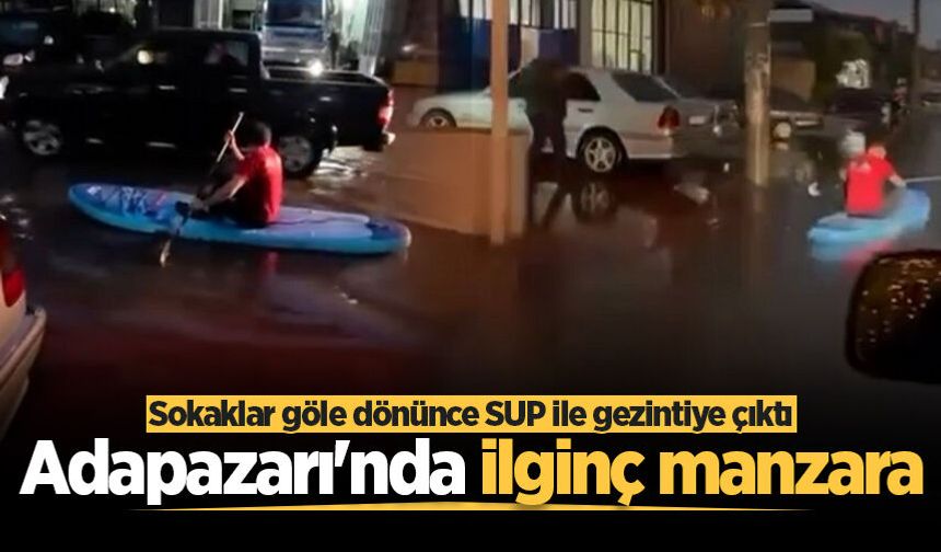Adapazarı'nda ilginç manzara: Sokaklar göle dönünce SUP ile gezintiye çıktı