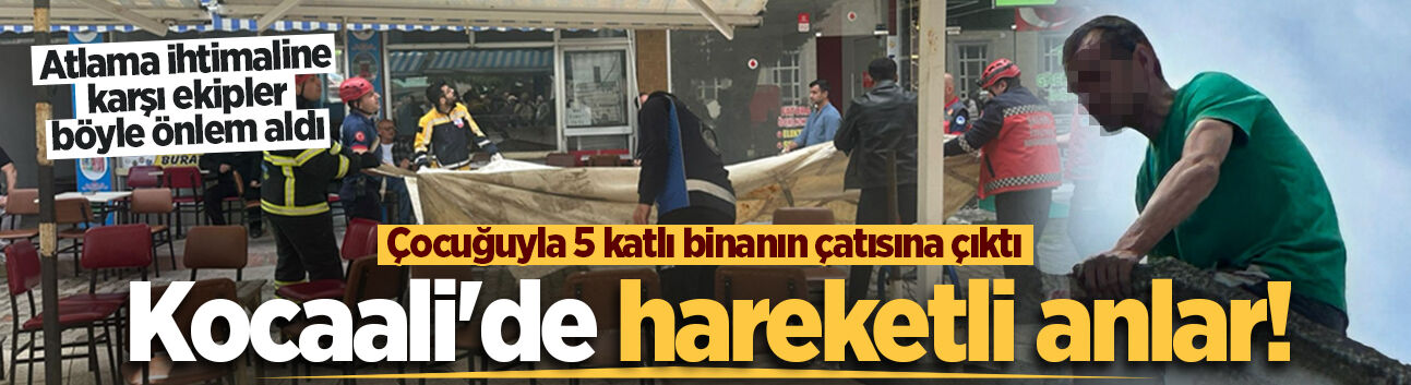 Kocaali'de hareketli anlar! Çocuğuyla 5 katlı binanın çatısına çıktı