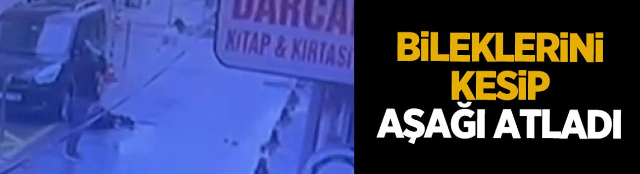 Şehir merkezinde dehşet anları; Bileklerini kesip aşağı atladı